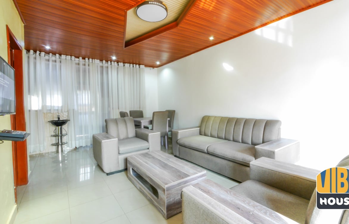 Living room with modern furniture - house for rent in Kacyiru, Kigali