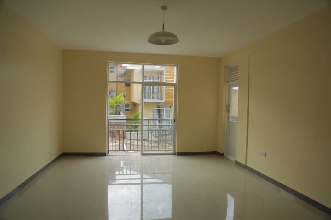 Well-lit living room in apartment for sale in Nyarutarma, Kigali